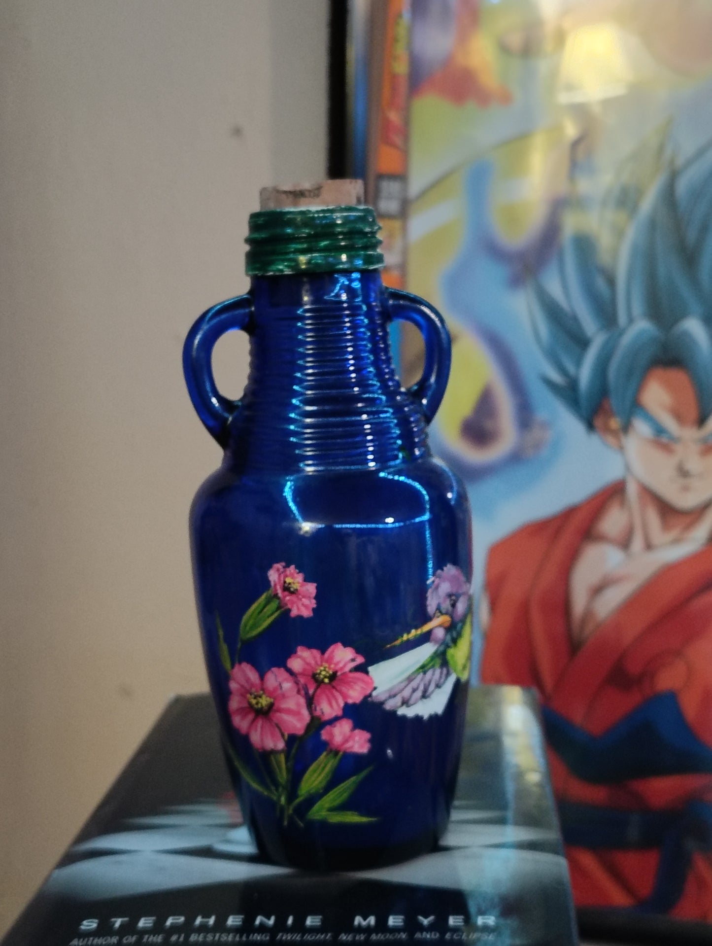 Antique 1930s Japanese bottle with art painted and cork in top, blue glass, immaculate condition....