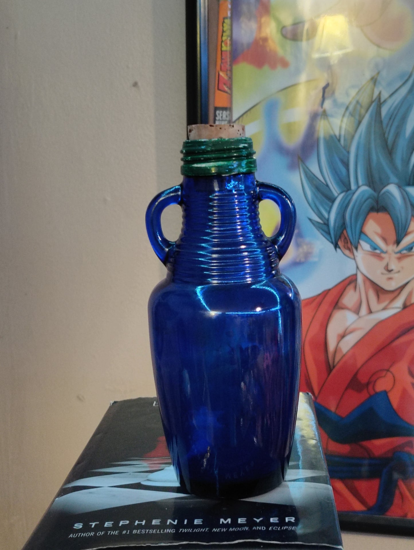 Antique 1930s Japanese bottle with art painted and cork in top, blue glass, immaculate condition....